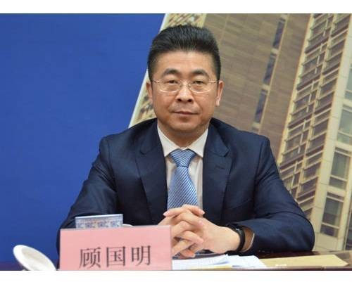 顾国明