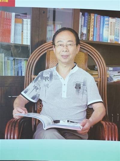 梁志刚(新昌城关中学校长兼党总支书记)