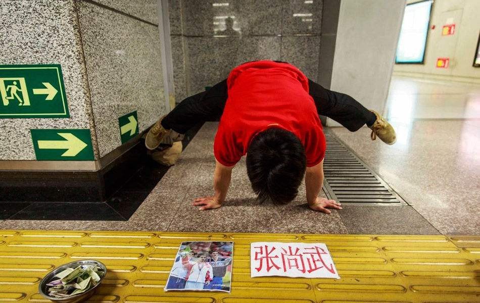 体操冠军张尚武因偷窃再度入狱,他是如何从辉煌跌入“地狱”的?